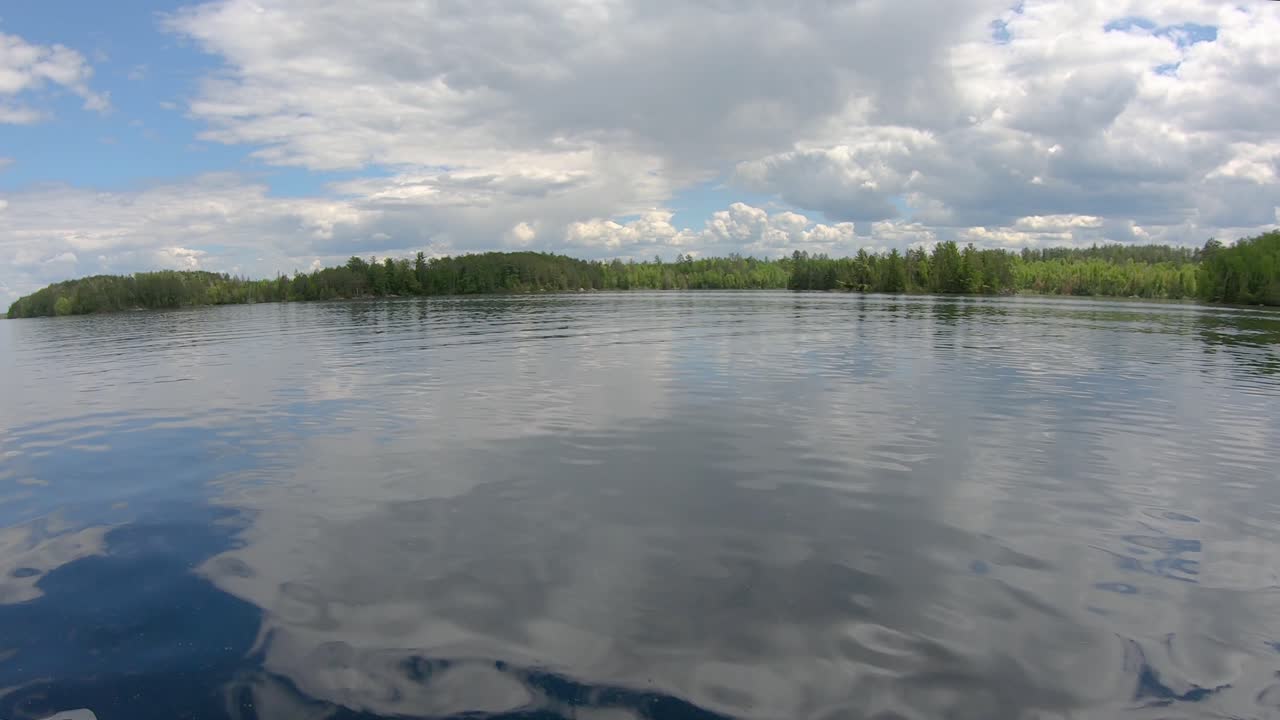 POV from fishing boat while cruising over open waters of flooded Lake Vermilion in northern Minnesota