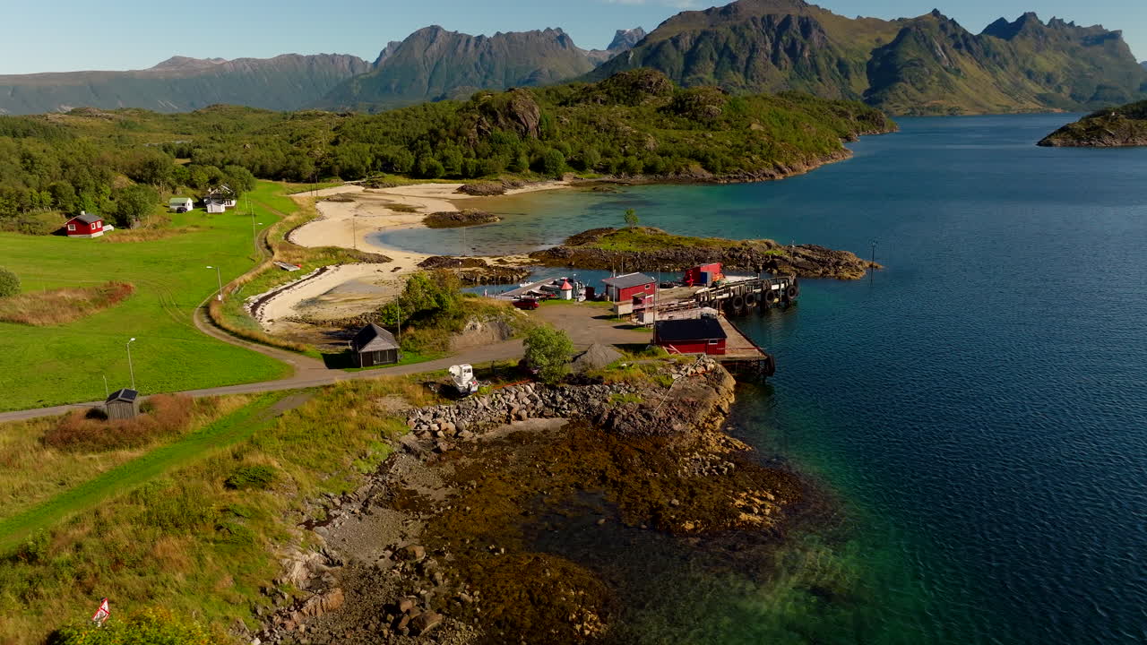 Scenic beaches and small harbour on Brottoya coastline, Hadselfjord. Aerial view