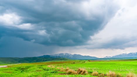 epic tornado formation over hilly terrain