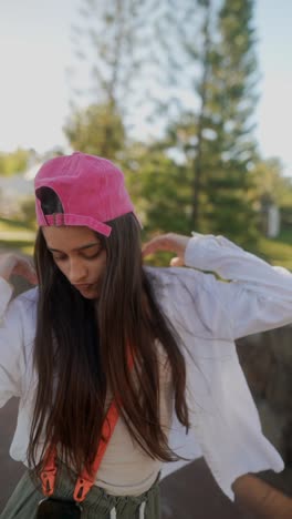 young woman taking a selfie outdoors