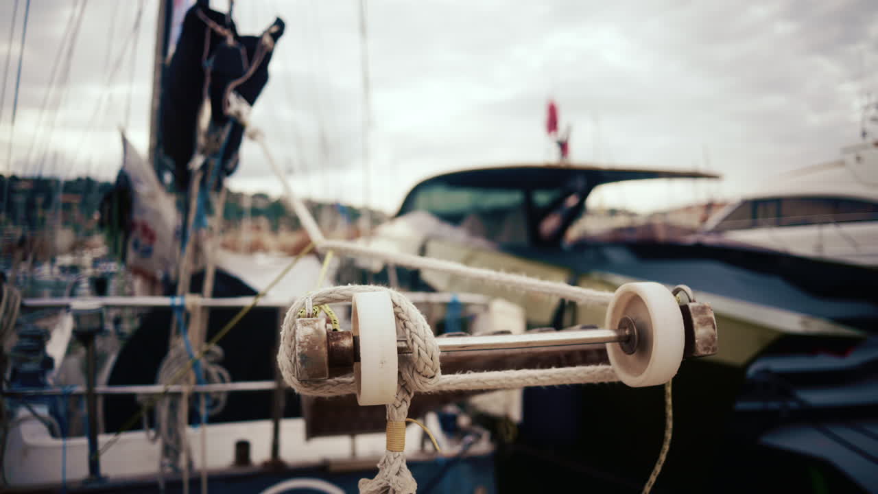 Close up of sailboat rigging and ropes in a marina in the South of France
