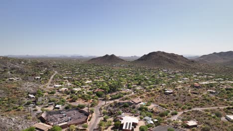 drone shot of arizona's rural housing in the heat of the desert