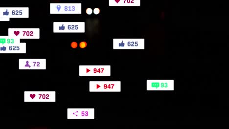 Animation-Von-Social-Media-Symbolen-Und-Zahlen-über-Unscharfen-Stadtlichtern