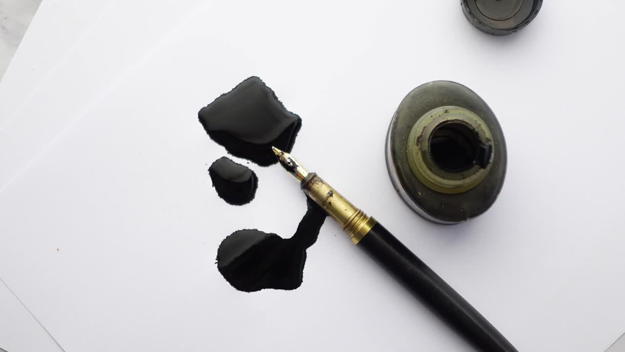 Vintage Fountain Pen with Ink Spill on Paper