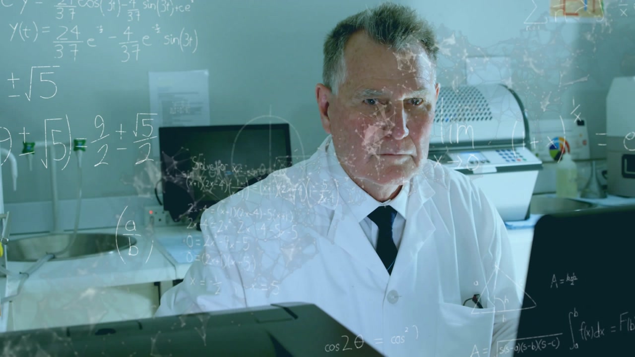 Senior lab scientist shifting gaze to laptop and typing, analyzing data while equations overlaying