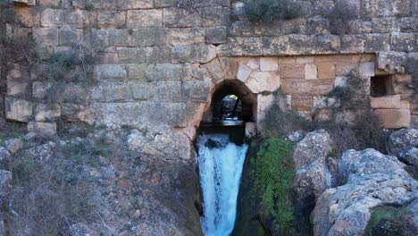 Aerial-view-of-a-roman-dam-built-in-the-first-century-in-Almonacid-de-la-Cuba,-Zaragoza,-Spain