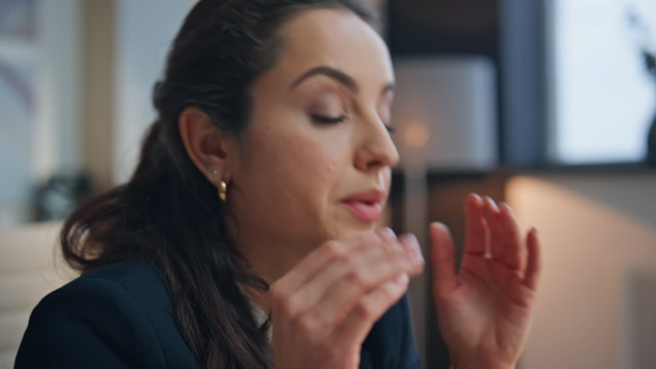 Woman hands closing laptop at workplace closeup. Tired businesswoman headache