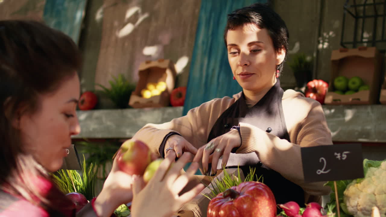 Customer Shopping for Fresh Produce at Farmer's Market