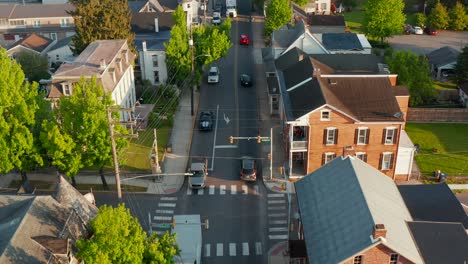 aerial dolly forward of traffic on street in america