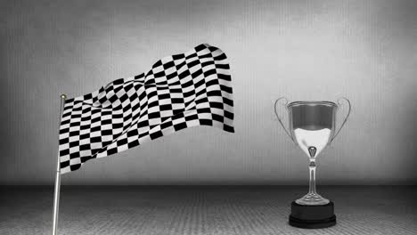 Racing-flag-beside-a-trophy