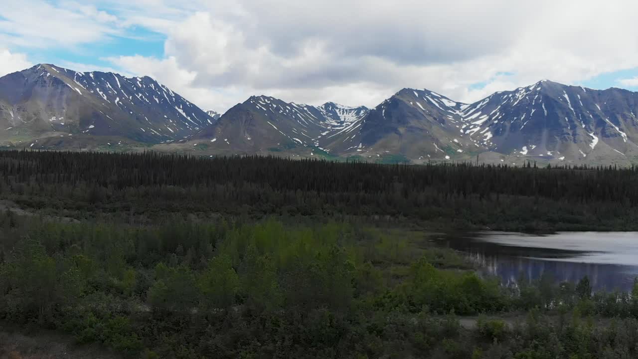 4K Drone Video of Mountain Peaks and Granite Creek near Denali National Park in Alaska on Sunny Summer Day