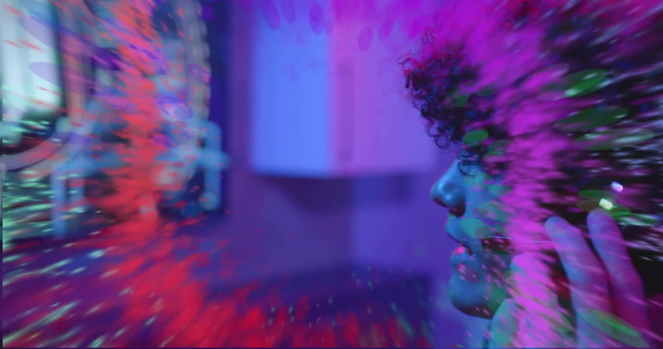 Streamer exhaling into headset and visualizing voice with neon ring pulsing, bursting, dissipating
