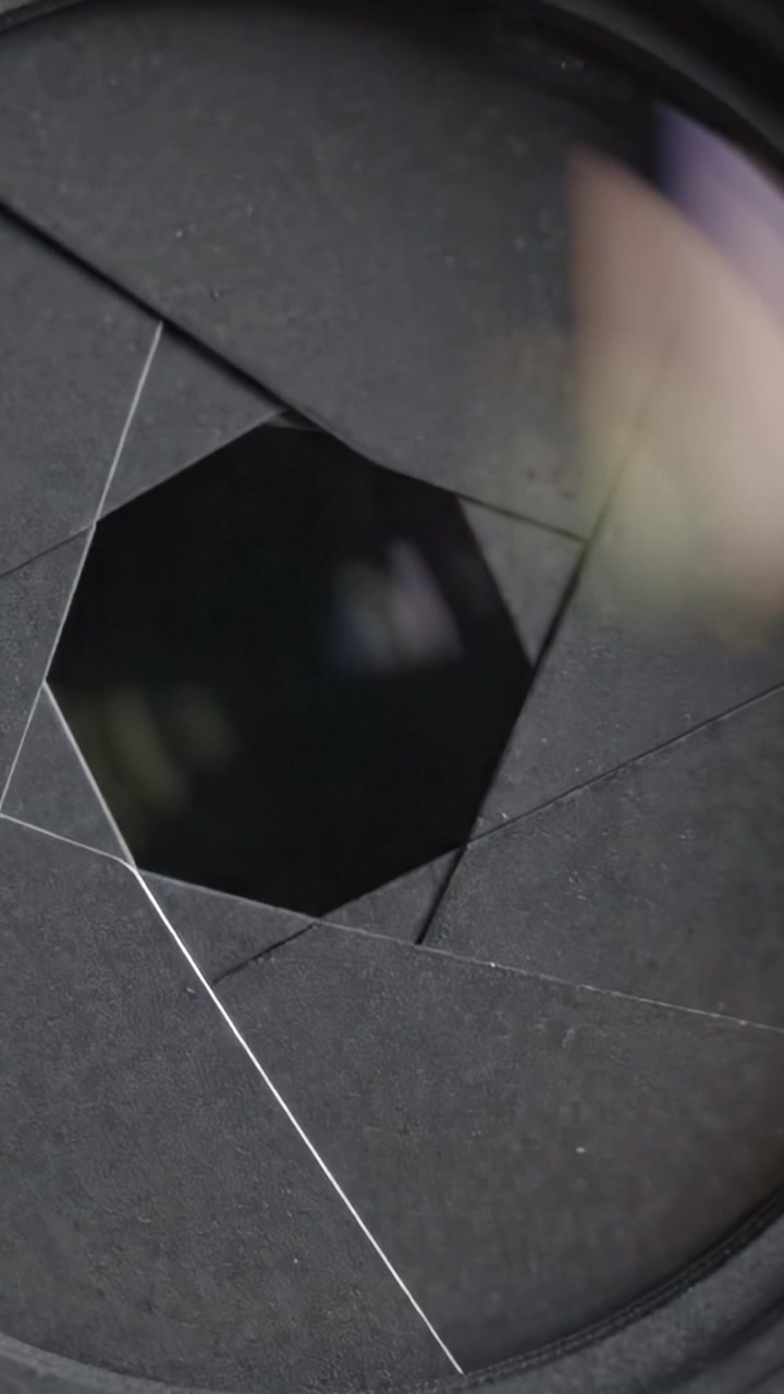 Close-Up of a Camera Lens Focusing with Reflection Enhancements, Capturing Light and Details in High Definition and Precision to Highlight Photography Technology