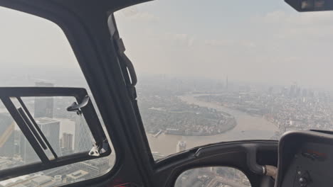 filming from inside a helicopter over london