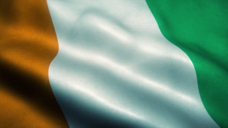 ivory coast flag waving in the wind. national flag of ivory coast. sign of ivory coast seamless loop animation. 4k