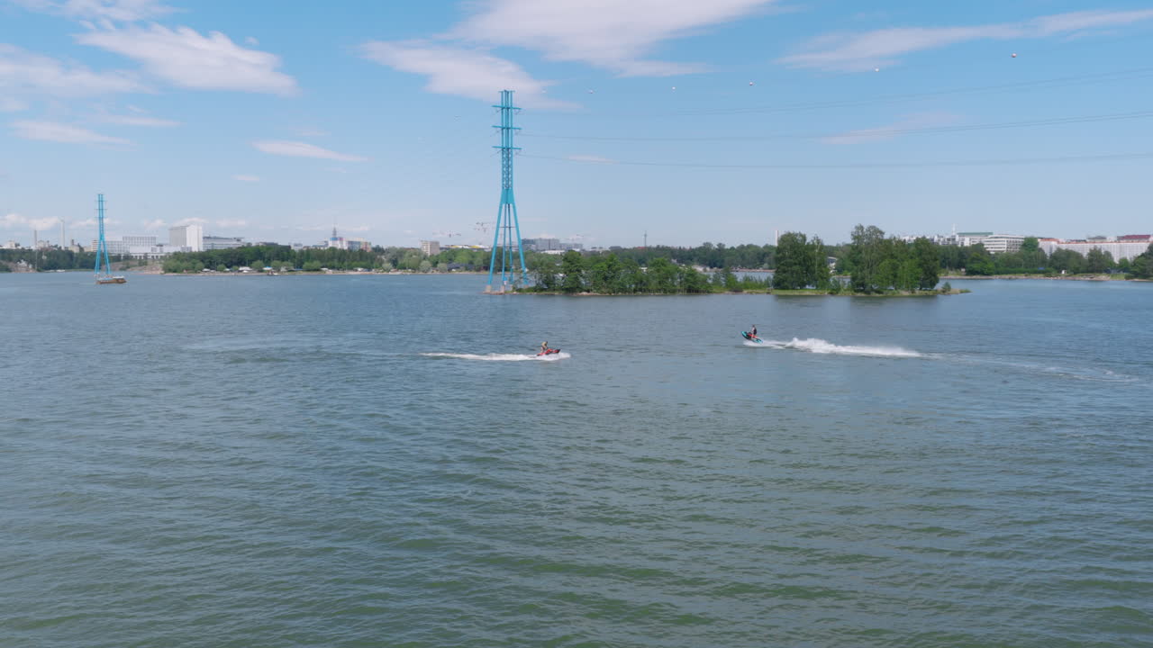 Aerial view of water scooters in front of Hietaranta beach, summer in Helsinki