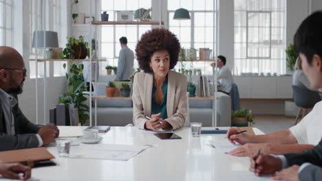 young-mixed-race-business-woman-executive-meeting-corporate-leaders-discussing-development-ideas-with-shareholders-brainstorming-in-office-boardroom