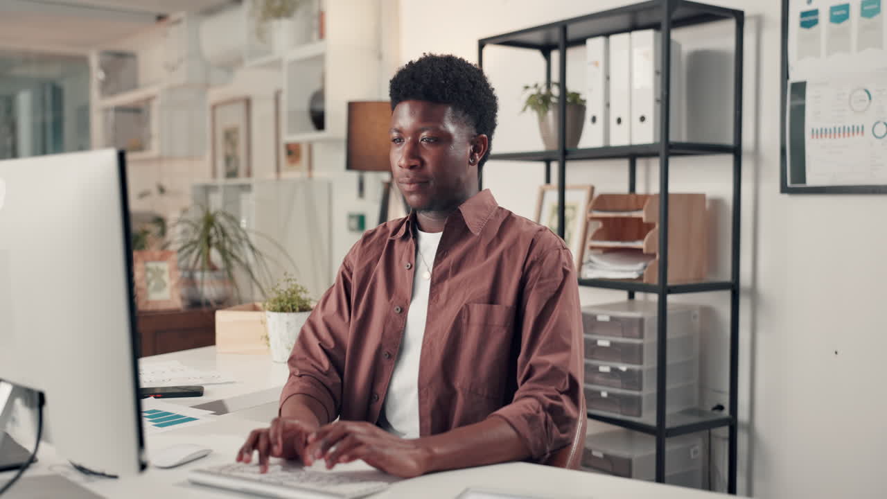 Man working on computer in office