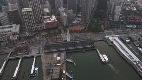 aerial view of the san francisco ferry building, in usa - high angle, orbit, drone shot