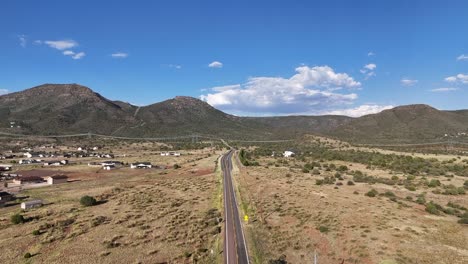 aerial view of road that leads into the mingus mountains outside of prescott valley in arizona, highway 89a