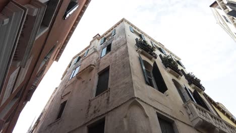 Towering-Old-Buildings-On-Venice-Grand-Canal-In-Italy