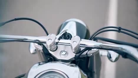 close view silver dashboard with black darts and headlight