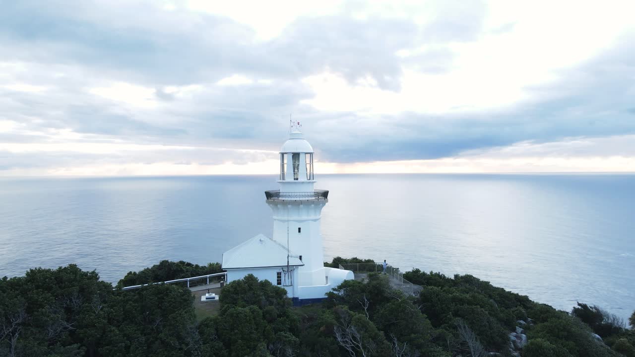 Scenic aerial panorama of the Smoky Cape Lighthouse located on a narrow coastal headland