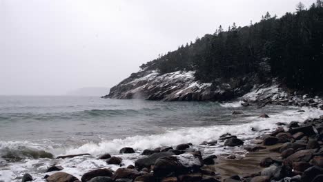 maine sand rock shore side view medium snow 60fps