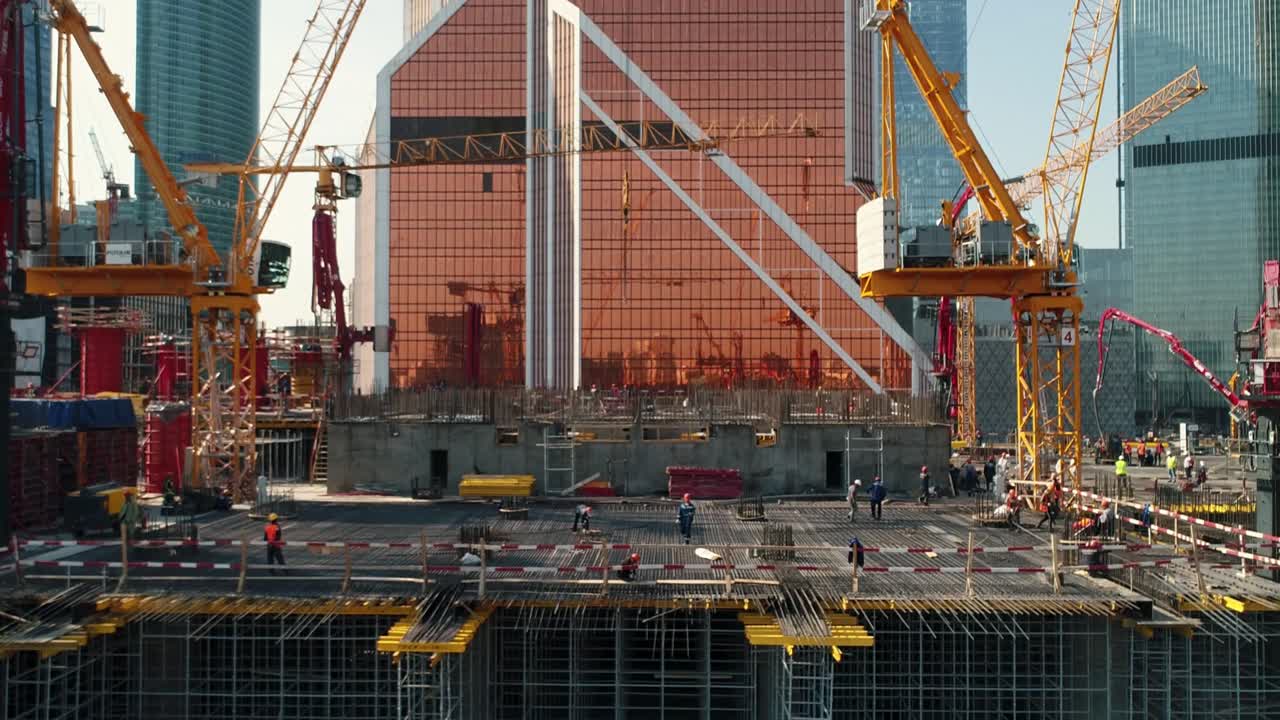 High scaffolds at highrise office building construction site