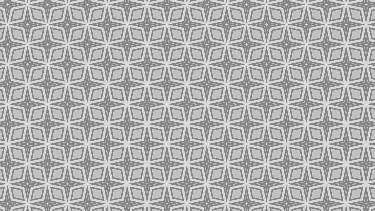 2D graphic video pattern that moves to the lower right with zoom, composed of designs and shapes with multicolored textures.