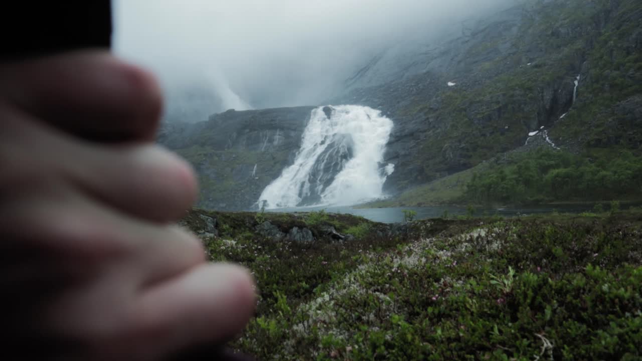 Husedalen waterfall in Norway, view from inside tent