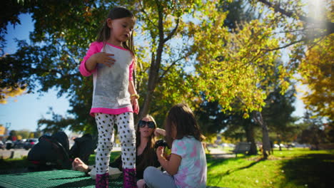 children playing in autumn park