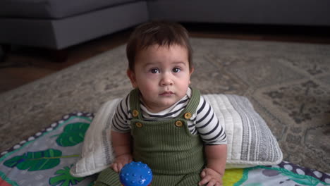 cute-adorable-biracial-mixed-race-mexican-hispanic-baby-infant-sitting-down-in-living-room