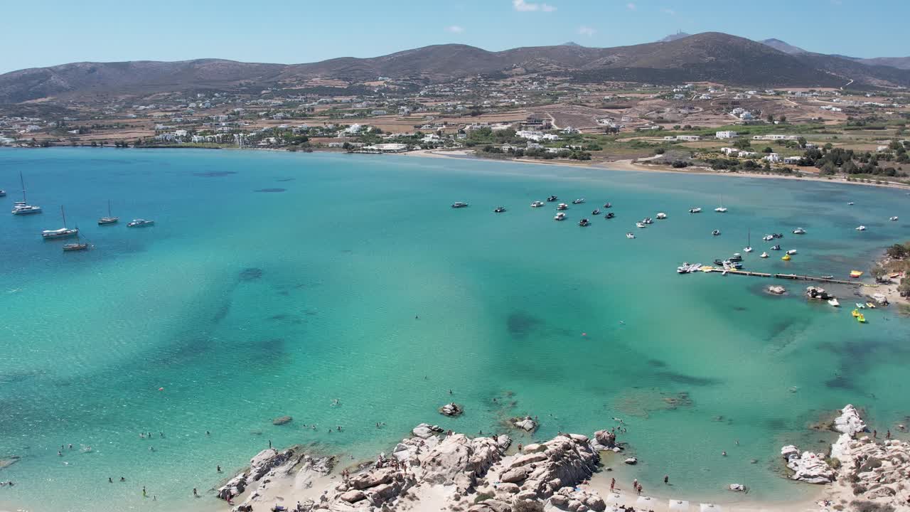 Aerial views from over Kolympethres Beach on the Greek Island of Paros