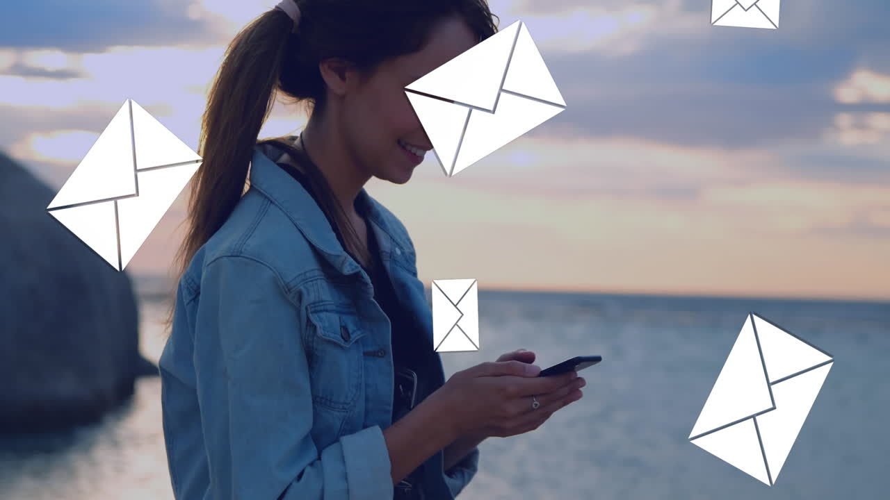 Woman texting on the beach 4k