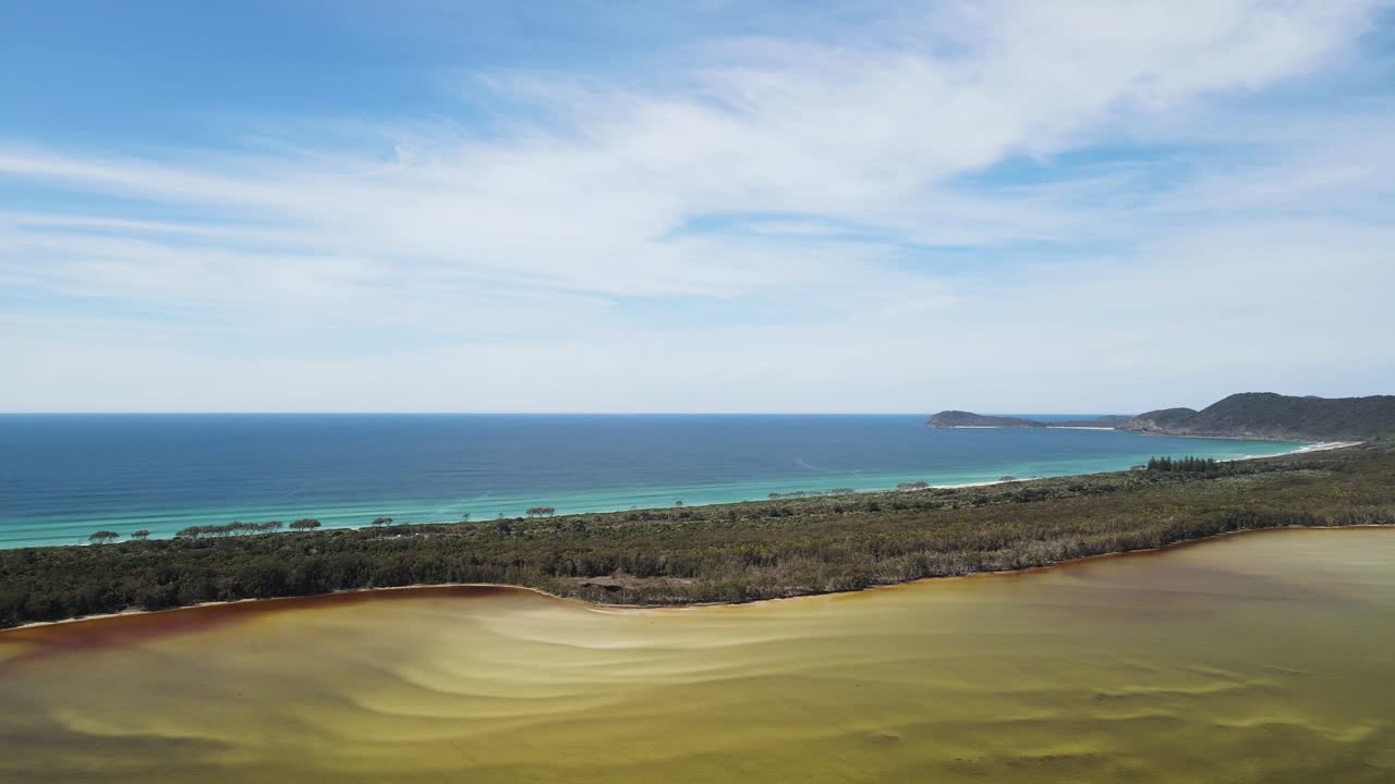 Aerial view of coastline with beach and ocean