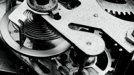 Watch mechanism macro loop. Old vintage clock mechanism working.