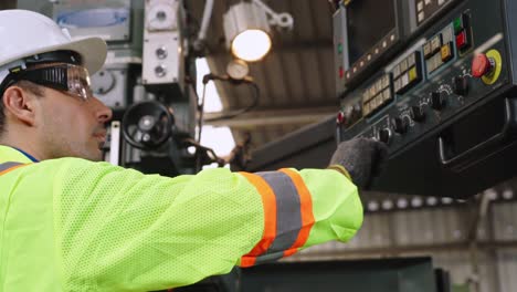 smart factory worker using machine in factory workshop