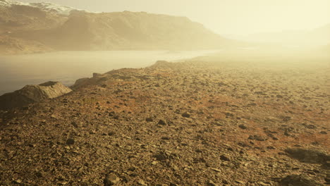 Atmospheric-landscape-with-mountain-lake-among-moraines-in-rainy-weather