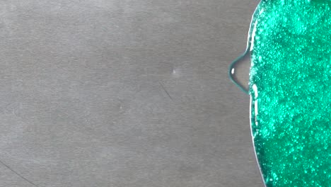green slime on a gray surface
