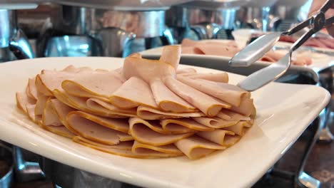 sliced ham on a buffet