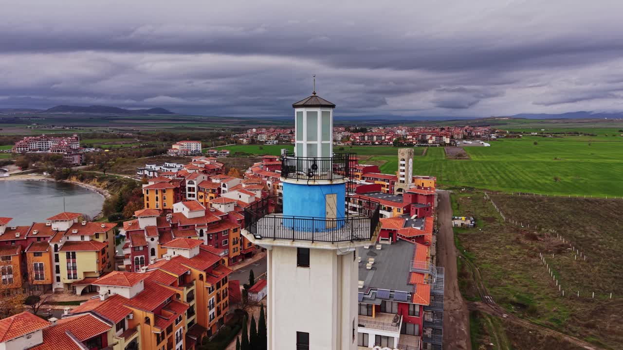 Stunning aerial view of a lighthouse in Bulgaria with green fields