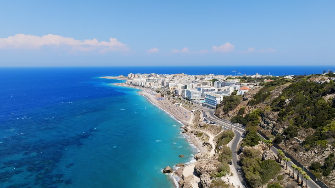 Establishing drone shot approaching the Rhodes city, sunny, summer day in Greece