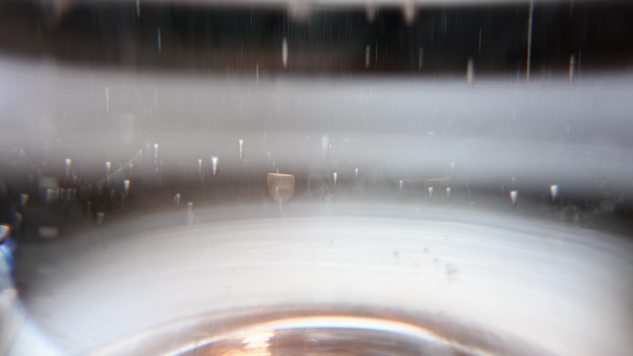 Blurred view through water creating soft abstract shapes and light effects
