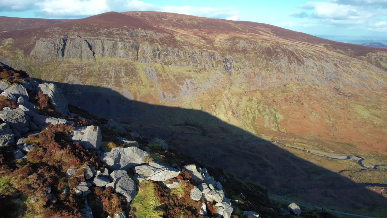 Irish mountains drone flying over rocky Craigs to reveal the stunning Mahon Valley and Falls Comeragh Mountains Waterford epic locations and landscapes