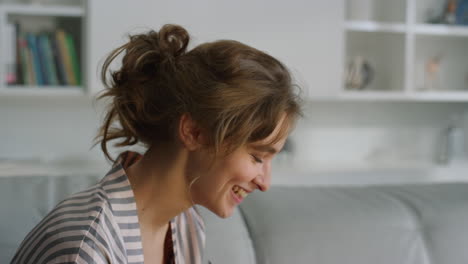 Woman-waving-having-video-call-at-home-closeup.-Happy-smiling-lady-talk-online.