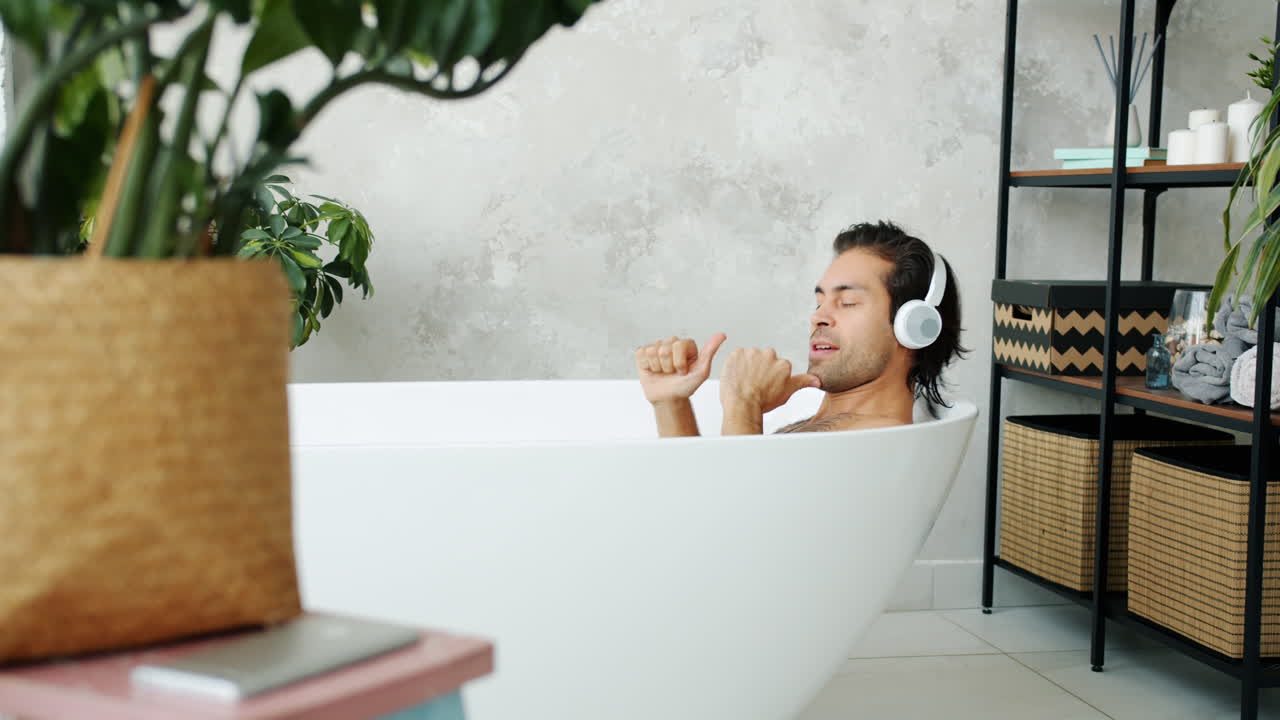 Man Singing in a Bathtub