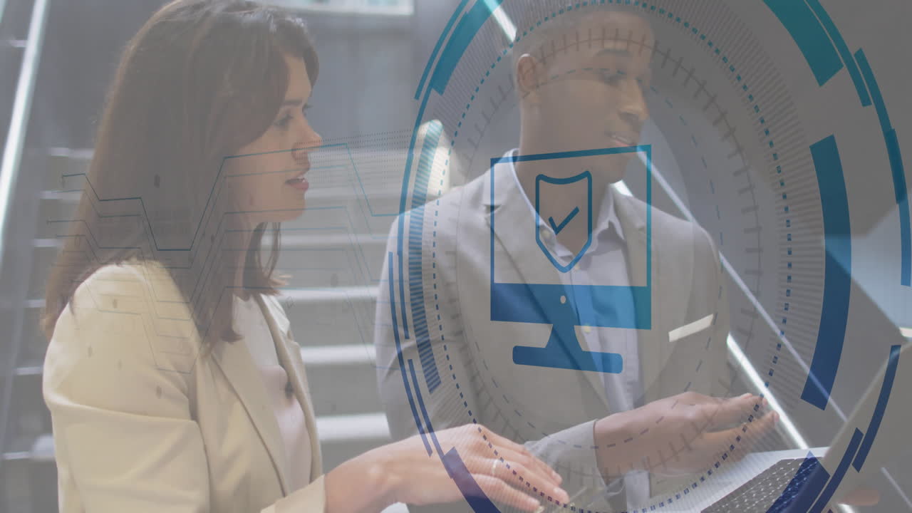 business professionals collaborating in office staircase, showing digital shield graphics and HUD
