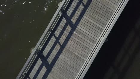 top-down view of wooden jetty of coliseum pier in biloxi across from the mississippi gulf coast coliseum and convention center