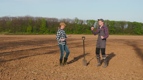 farmers dancing in a field